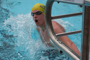 Brandon Spitler makes an open turn at the championship meet for the Kansas City Blazers. He swam a 1:09.52 in the 100 breastroke and he placed 10th. Photo submitted by Katherine Spitler.