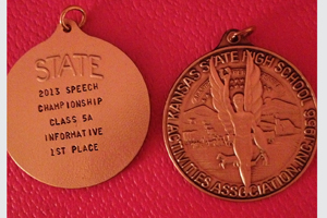 The 2013 Forensics competitions champion medal, awarded to Fronczak.