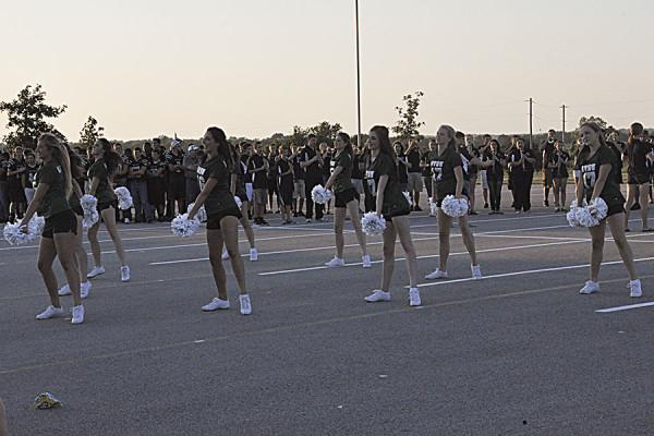 Glitter Girls perform at the BVSW homecoming bonfire.