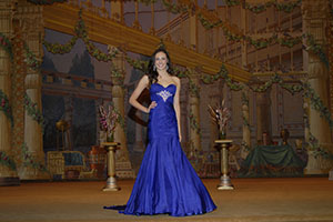 Madison Moore poses onstage during Evening Gown at the Miss Kansas Teen USA 2013 pageant, where she finished in 6th place and also received the Congeniality Award and Peoples Choice Award. 