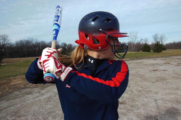 Swickard warming up her swing before a game