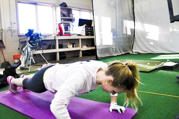 A Golfer does pushups