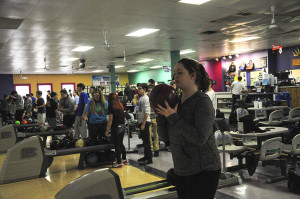 Sophomore Londyn Bogseth holds her ball and lines it up during practice at the home lanes.