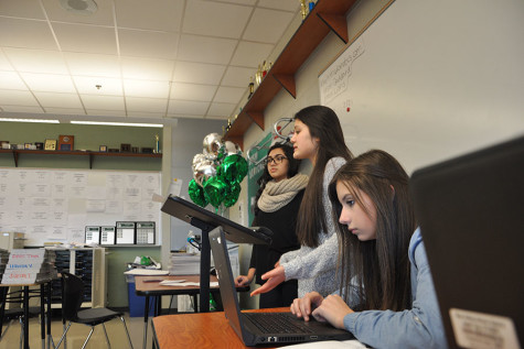 Freshmen Rachel Holzer. Sumaya Hussaini, and Mera Hassan have a practice debate after school to prepare for the upcoming competitions.