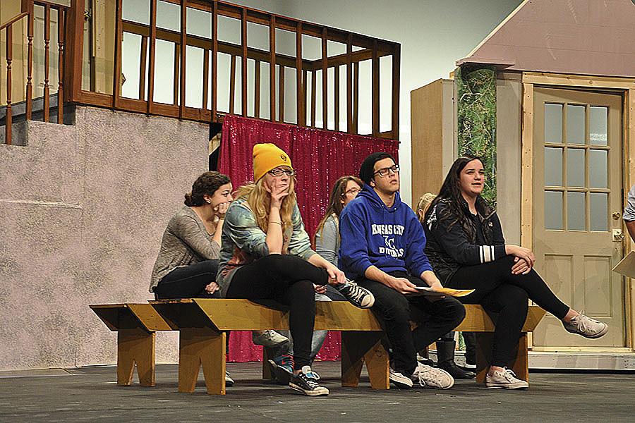 The cast of Legally Blonde is practicing scenes for opening night.
