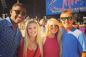 Juniors Butch Clemons, Addy Emerson, Olivia Carney and Matt Nixon tolerate the heat in order to see Flo Rida perform at Red White and Boom. 