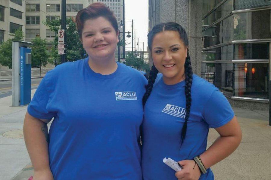 Two members of the American Civil Liberties Union smile. This organization advocates on a wide platform of issues, including government survalence, incarcerations and LGBT rights, according to the orgainization’s website.