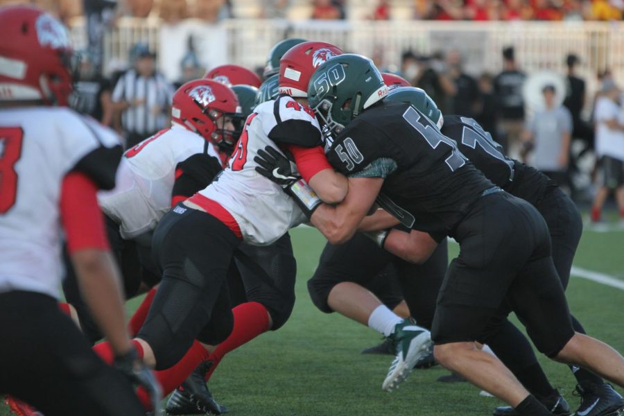 Senior Jaren Williams defends the quarter back during the third quarter.