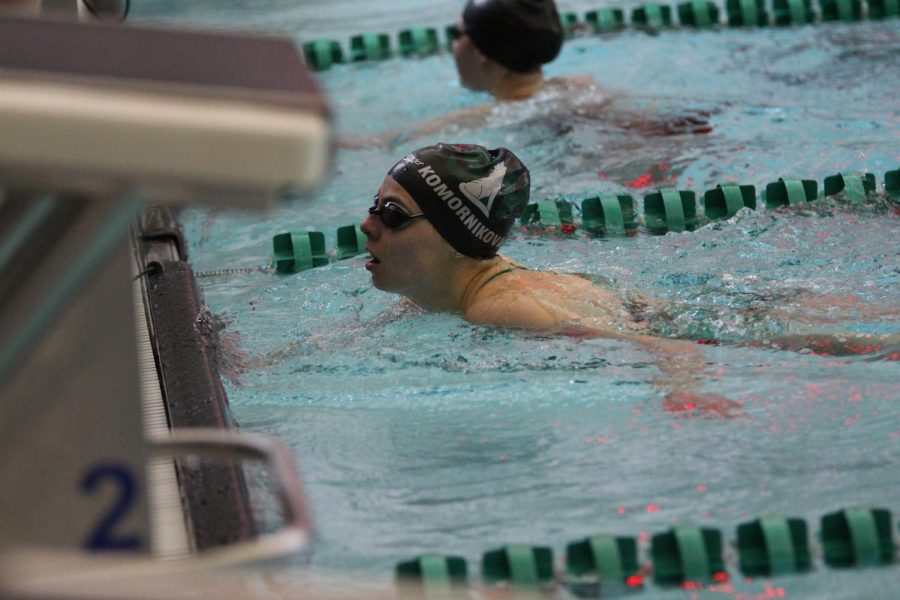 After she finishes swimming, Natalia Komornikova relaxes in the water.