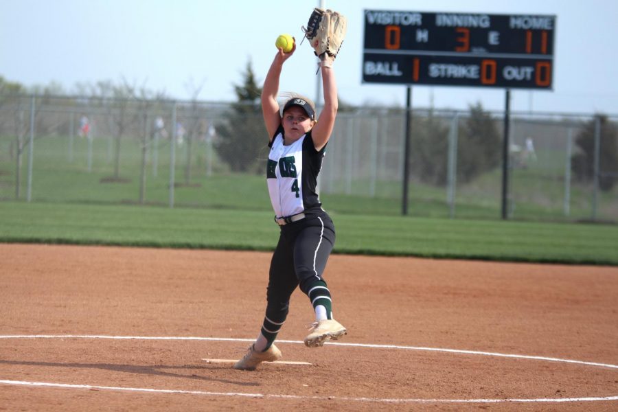 Pitching the ball, freshman Jessica Bell focuses on the opposing teams batter.  The junior varsity team played at home against Blue Valley Northwest High School on Tuesday April 16. 