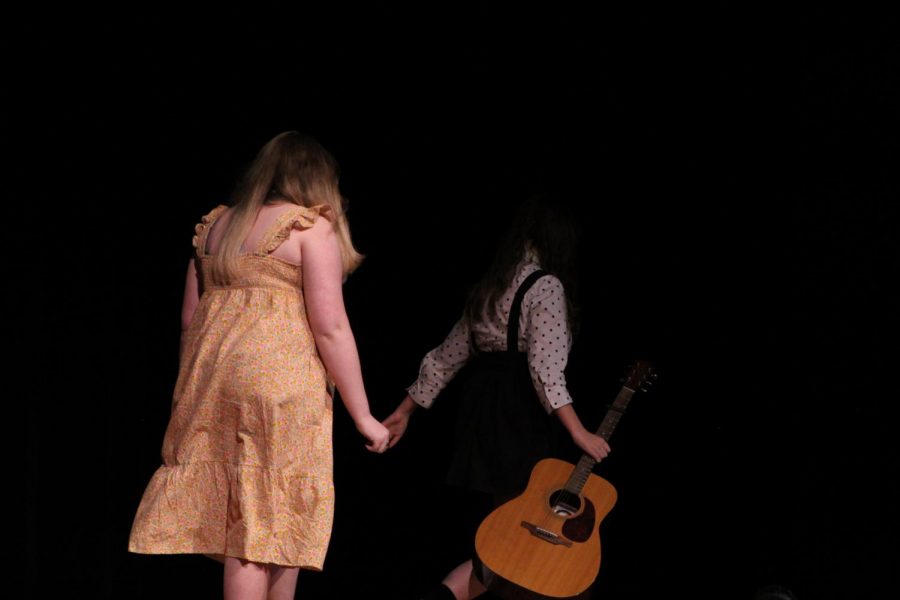 Junior Carolyn Brotherson and Senior Alyssa Cangelose exit the stage after performing their duet.