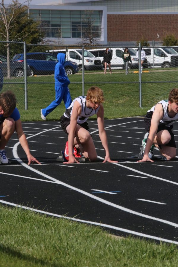 Alongside his competition, freshman Jackson Harmon ready to race.