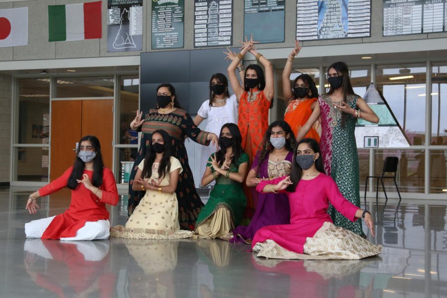 Posed for the camera, the Bollywood dancers end their performance. 