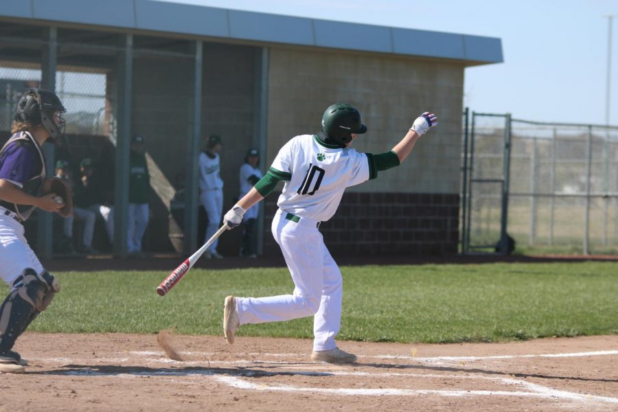 Junior Kaden Moore after a swing. 