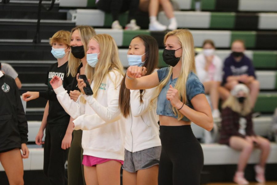 Dancing in line, sophomore Cece Bahr dances to the Renegade on April 28th at the freshmen assembly.