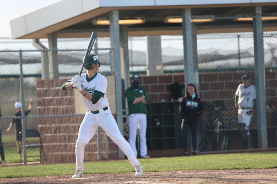 Senior Tristen Everard looks pitcher in the eyes ready to swing 