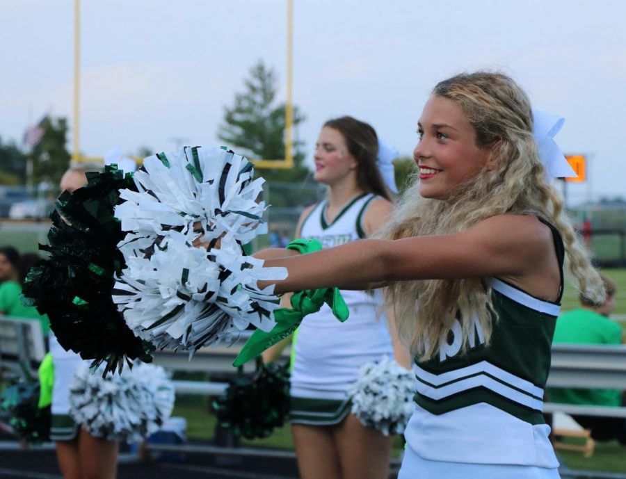 Freshman Camille Mitchum cheers at the senior night game on Sept. 3