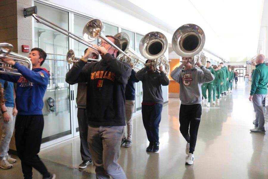 Emerald Regiment Band sends off varsity boys basketball  on March 9