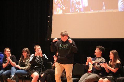 Senior Thomas Palecki pumps his fists in celebration during an announcement that he plans to study music education at University of North Texas.