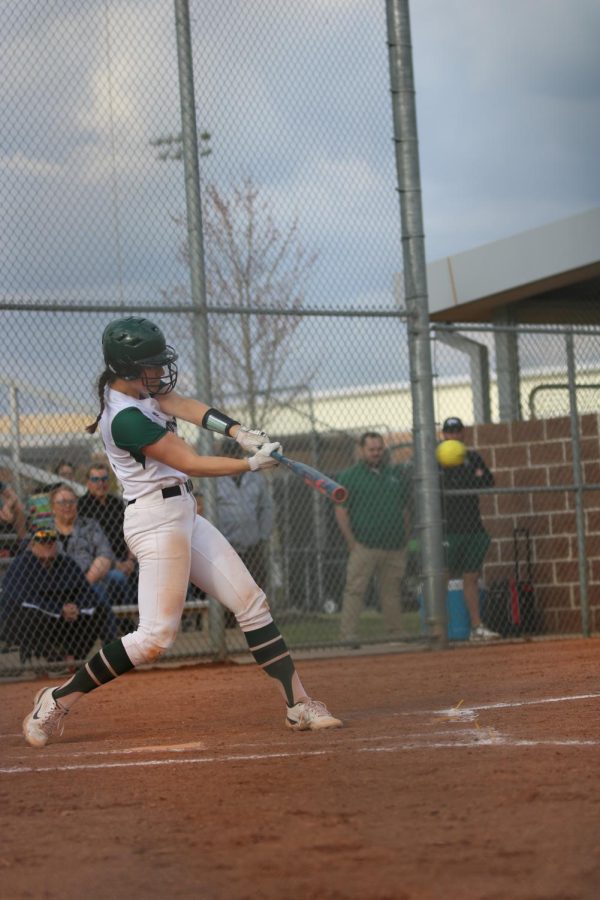 Senior Carsen Tinkler hits the ball on March 29.