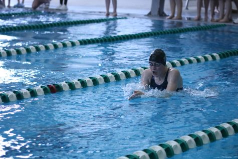 Swimming breaststroke, sophomore Miriam Hill swims the 200 Medley at EKL on May 6.