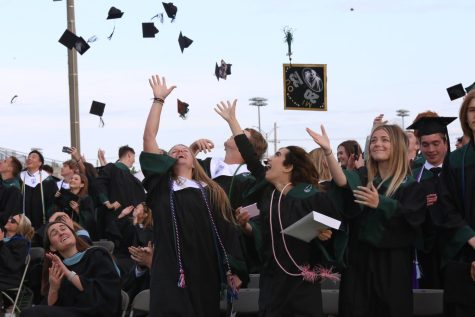 Class of 2022 celebrates graduation with a toss of their caps on May 21.