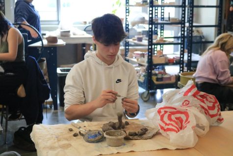 Ceramics student creates project for Mothers Day on May 3rd. 