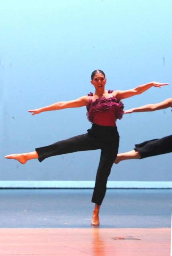 Focused on her technique, senior Caroline Sorcher participates in the senior class dance during the showcase on April 7.