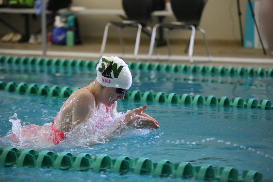 Junior Miriam Hill swimming breast stroke comes towards the end of her race. 