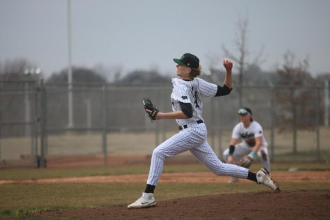 Anson Siebert pitches the ball.