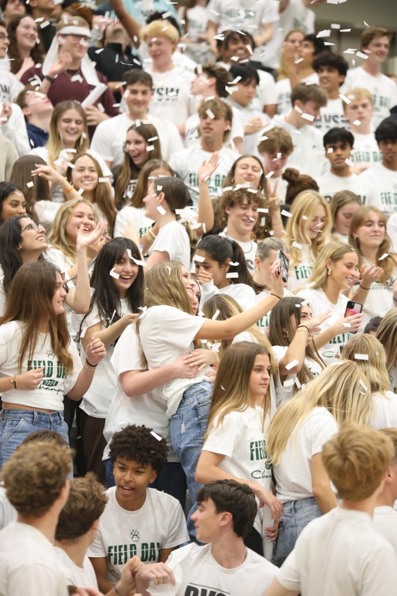 Alongside the senior class, senior Meredith Heyka takes a photo on May 2. This was her last assembly at Southwest.