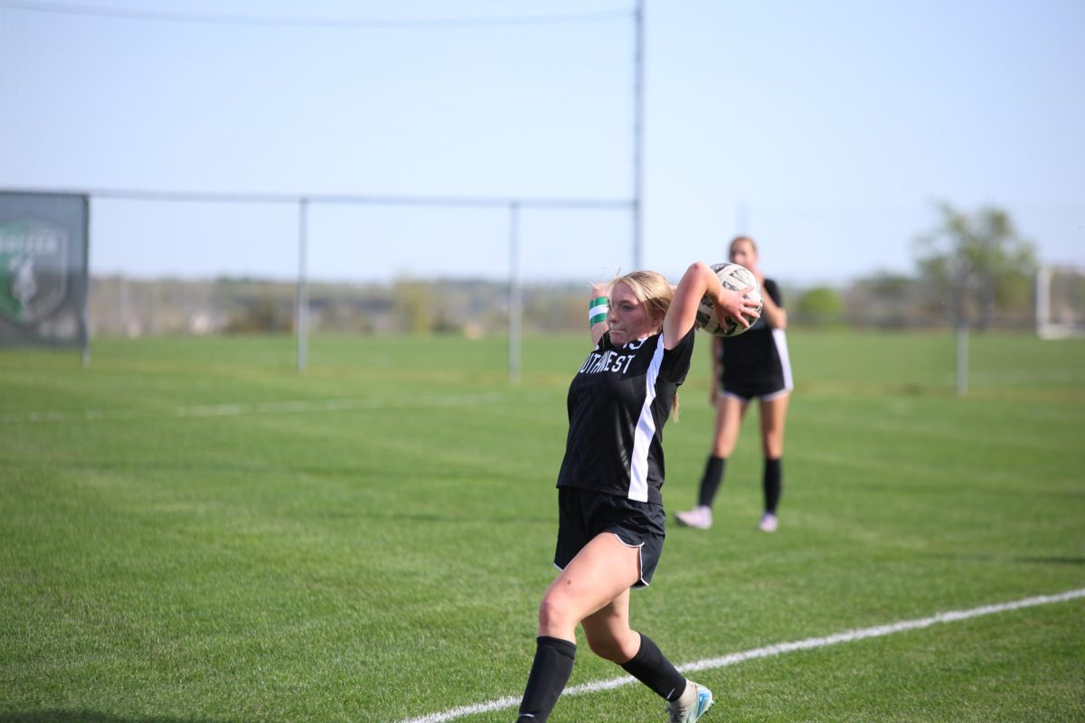 Junior Kiley Shamet leans forward while throwing the ball.
