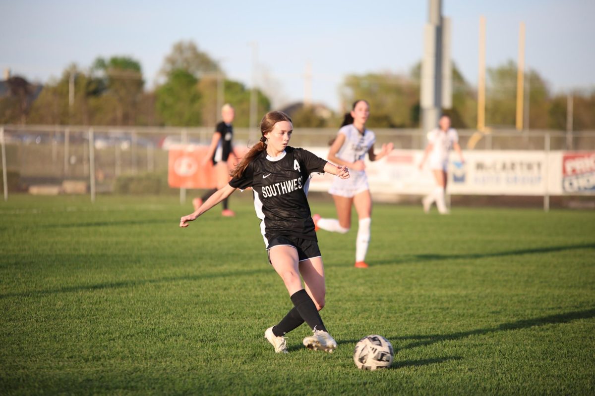 Sophomore Gabby Cowan passes the ball to a teammate.