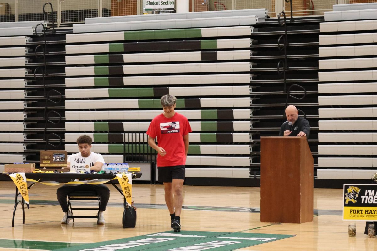 Laughing, senior Israel Bernal laughs as Rasmussen says his funniest soccer moment
