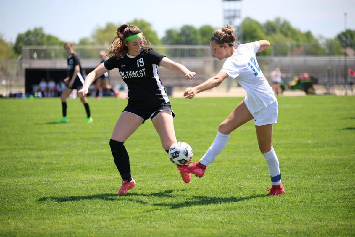 On May 10, sophomore Rory Robertson steals ball from opponent.