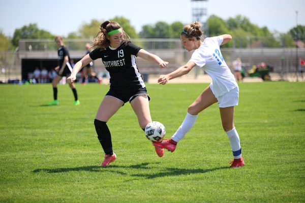 On May 10, sophomore Rory Robertson steals ball from opponent.