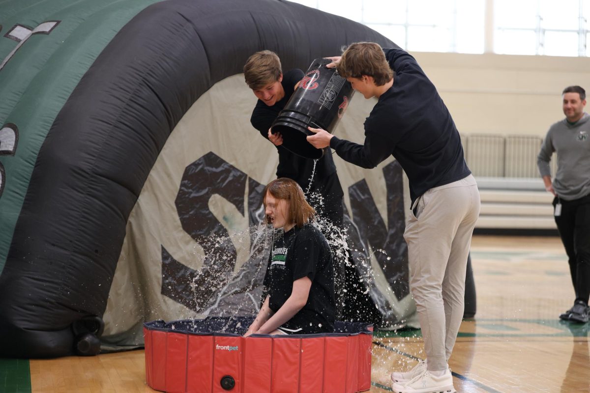 Junior Sophia Sponseller gets ice poured on her while doing the ice bucket challenge. 