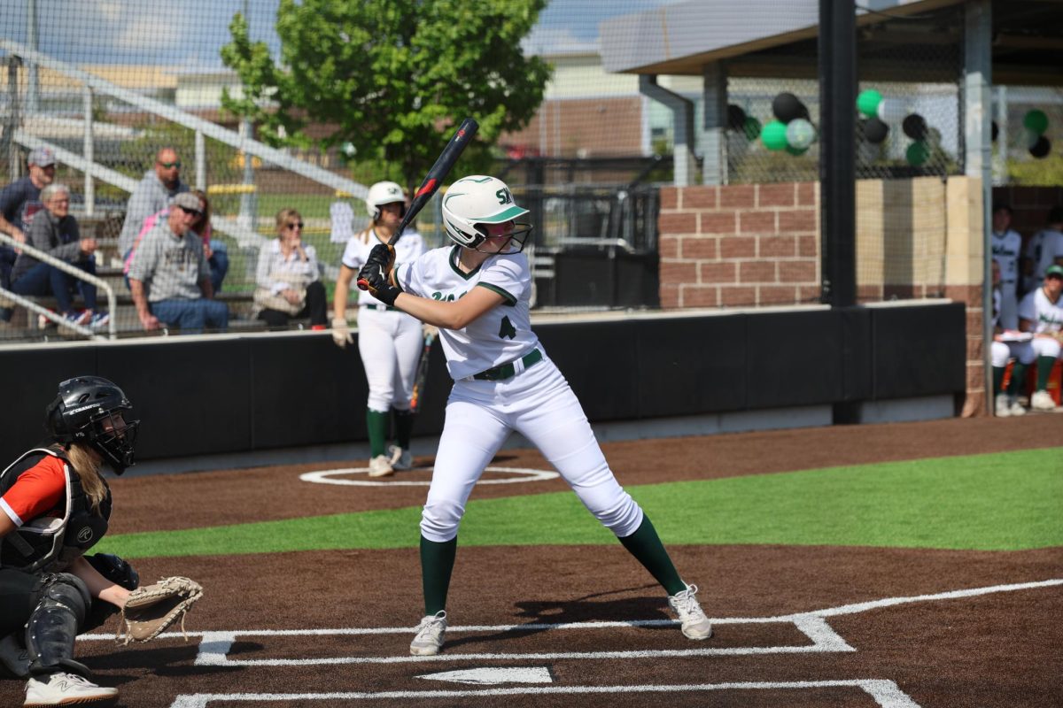 Junior Addison Jones prepares to swing her bat. 
