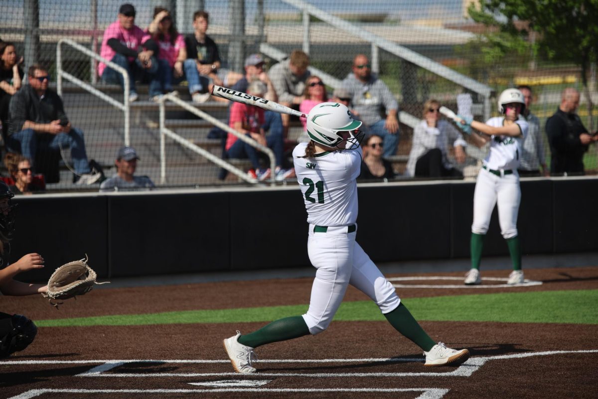 Senior Lily Unruh follows through her swing.
