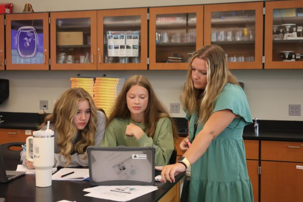 Science teacher and alum Caroline Ayres has been taught by some of her now-colleagues