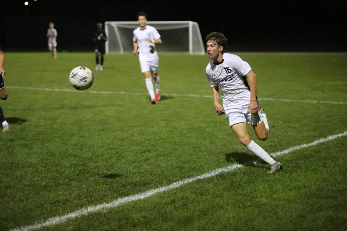 On Sept. 30, junior Tanner Levy runs after the ball.