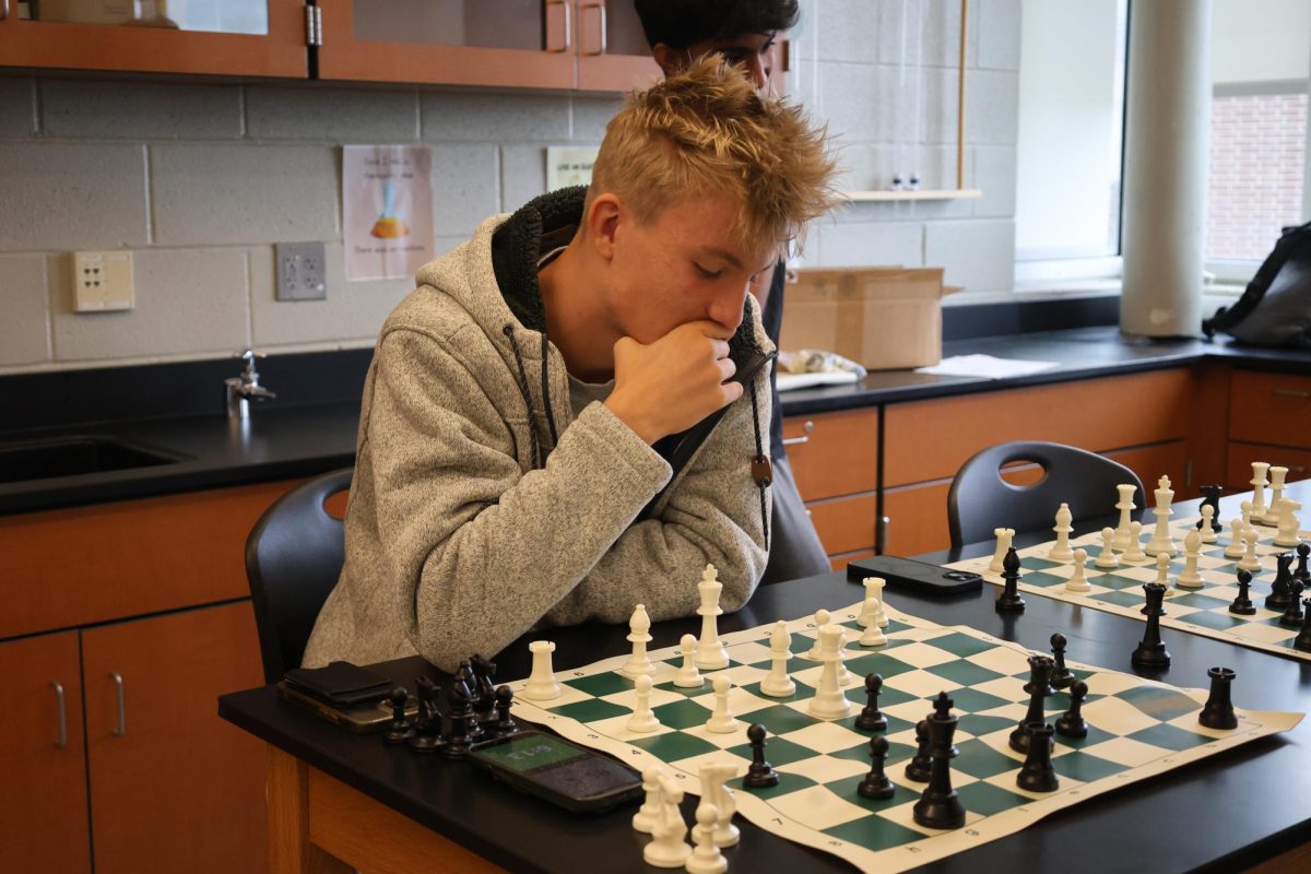 Members, sponsor describe the process of starting chess club