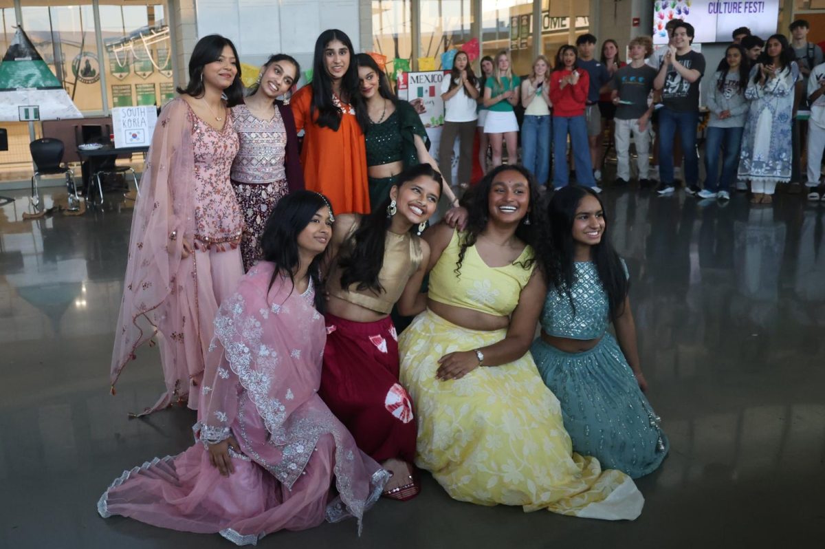 Posing for the cameras, the Bollywood dancers smile after their performance at Culture Fest on April 8. 