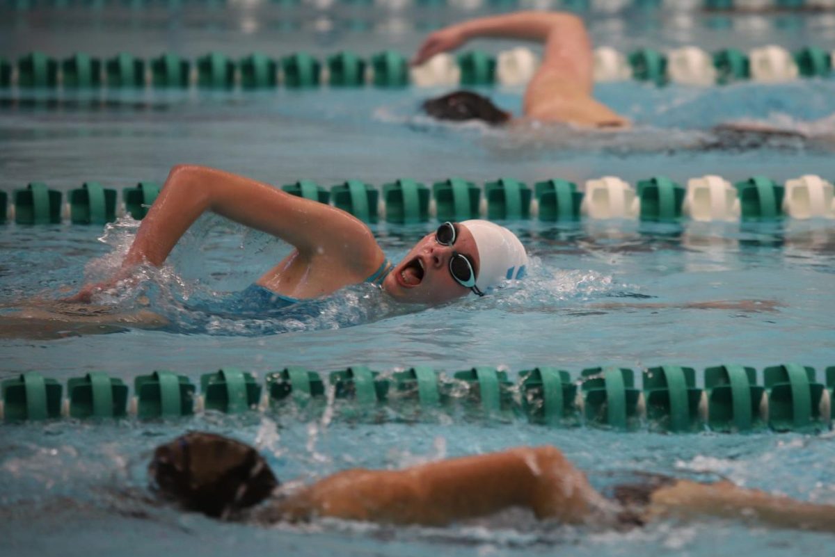 Freshman Katie Carioscia laps her competitors during her swim meet on March 28. 
