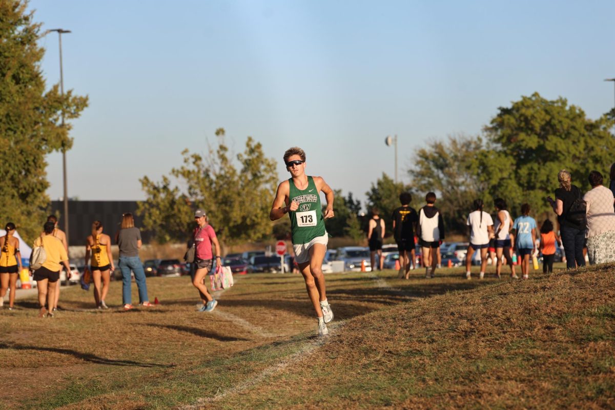 Senior completes high school running career with new title