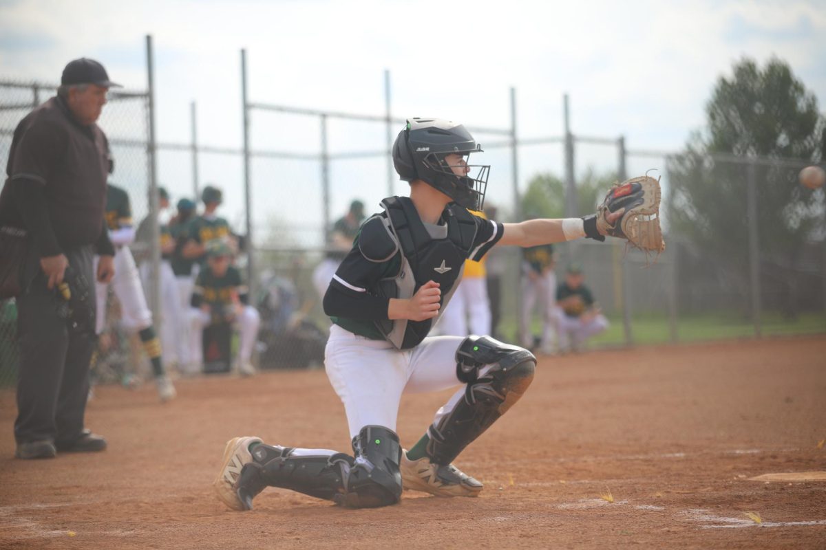 Arm out, Southwest catcher traps the ball in his glove on April 30.